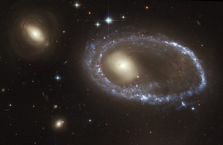blue-stars-circle-nucleus-of-galaxy-am-0644-741-2004_49576593371_o-740x481.jpg